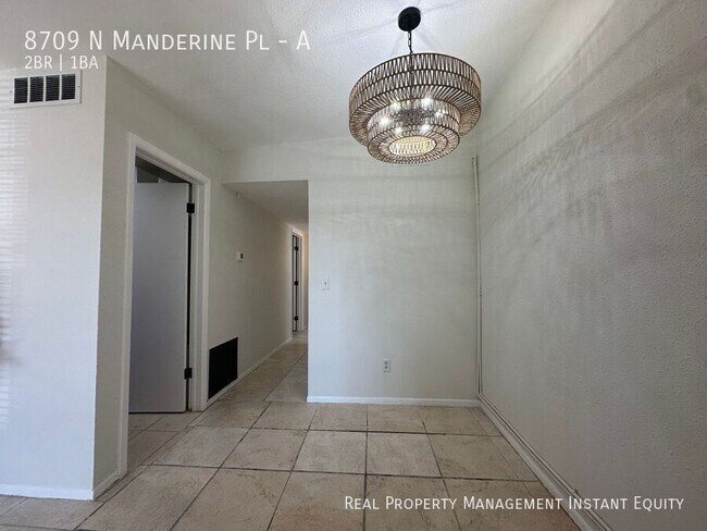 Building Photo - 8709 N Mandarine Pl