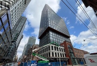 Building Photo - 100 Queen St E