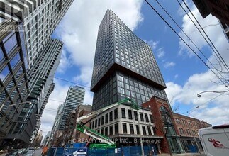 Building Photo - 100 Queen St E