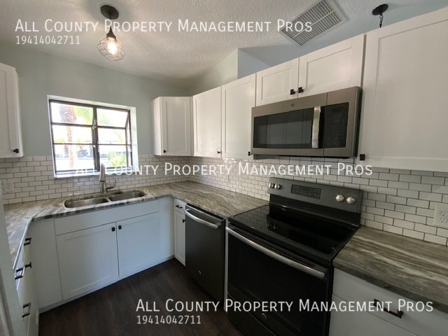 Building Photo - Villa Style Condo With Dual Master Suites,...