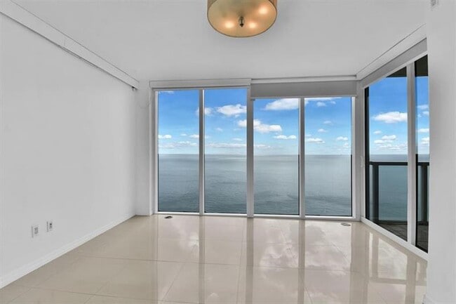Building Photo - 16699 Collins Ave