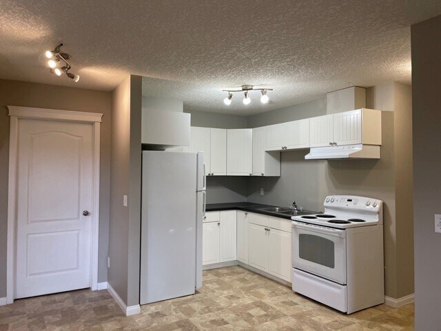 Photo du bâtiment - 1 Bed 1 Bath Unit in Didsbury, AB