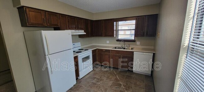 Building Photo - 17305-17307 East 48th St Ct S