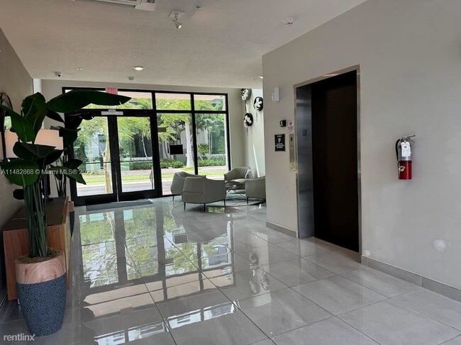 Building Photo - 3 br, 2 bath House - 8363 NW 41st St # A-308