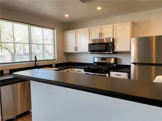 Building Photo - 9330 W Maule Ave