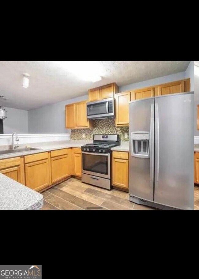 Foto del edificio - 5563 Windfall Ln