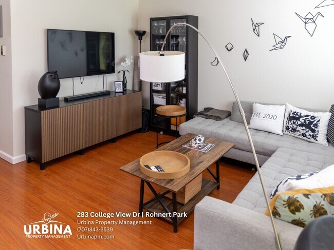 Building Photo - Two Bedroom Townhouse with Private Patio and Community Pool