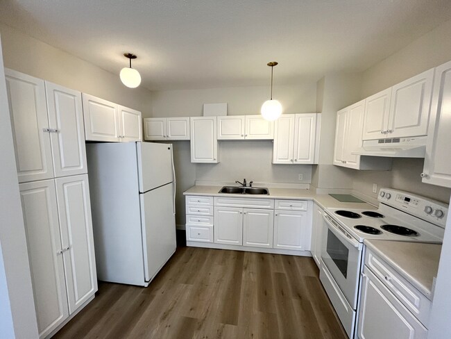 Photo du bâtiment - Bowness Village Apartments