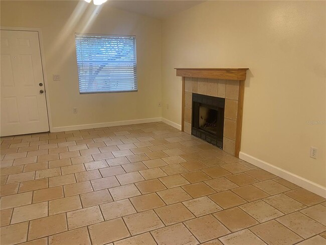 Living room with fireplace - 3804 59th Ave W