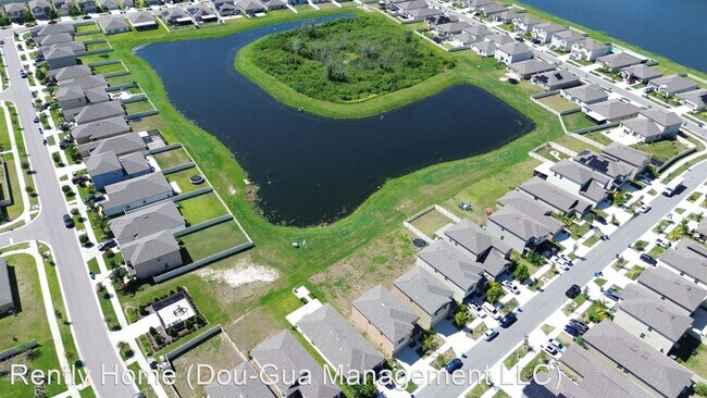 Building Photo - 5 br, 2.5 bath House - 15625 Spice Key St