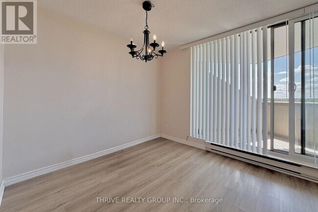 Building Photo - 1105-1105 Jalna Blvd