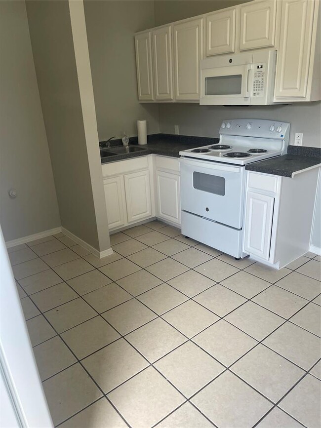 Foto del edificio - 5309 Woodland Oaks Ct