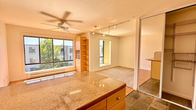 Building Photo - Exceptionally Remodeled Top-Floor Bright Studio
