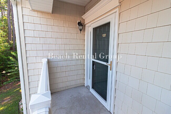 Foto del edificio - 3 Bedroom End Unit w/ Screened-In Balcony