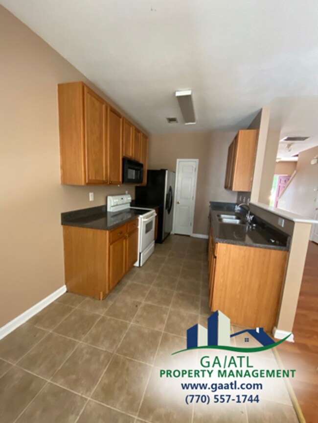 Foto del edificio - Spacious 3-bedroom townhouse in Riverdale