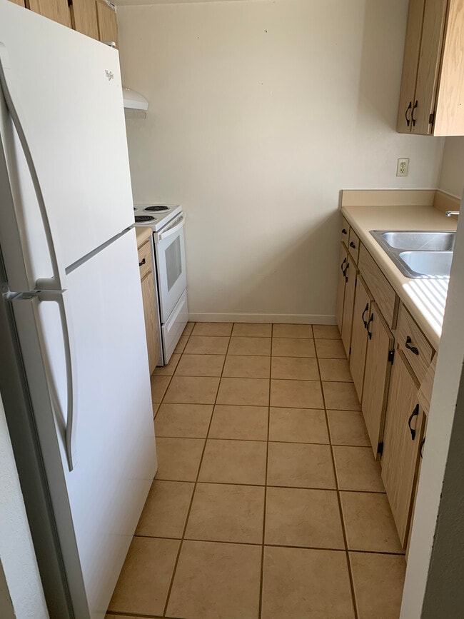 Kitchen View {Pictures taken BEFORE painting.) - 818 Placid Lakes BLVD