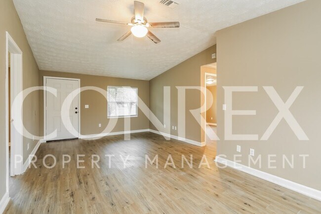 Building Photo - Charming Four Bedroom with Modern Upgrades