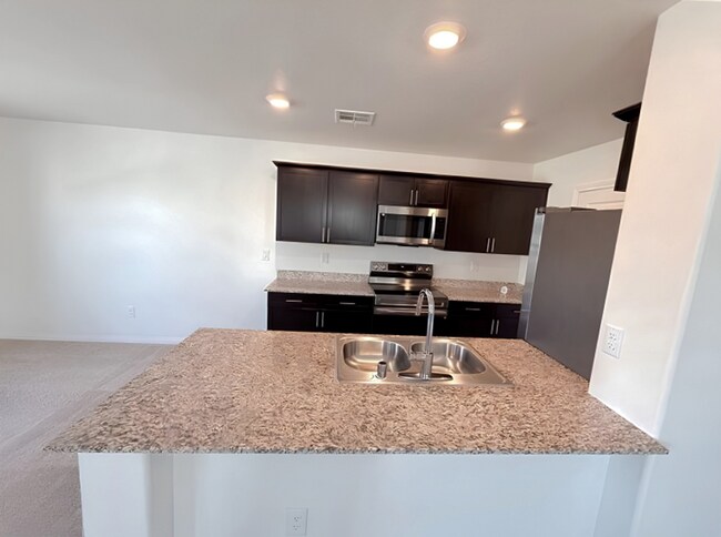 Building Photo - Stunning Tri-Level Townhome with Breathtaking Nevada Mountain Views