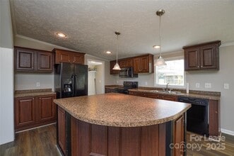 Building Photo - 711 W C J Thomas Rd