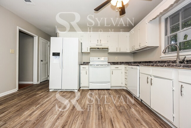 Building Photo - Turn the key. Enter. Smile. Repeat every day!