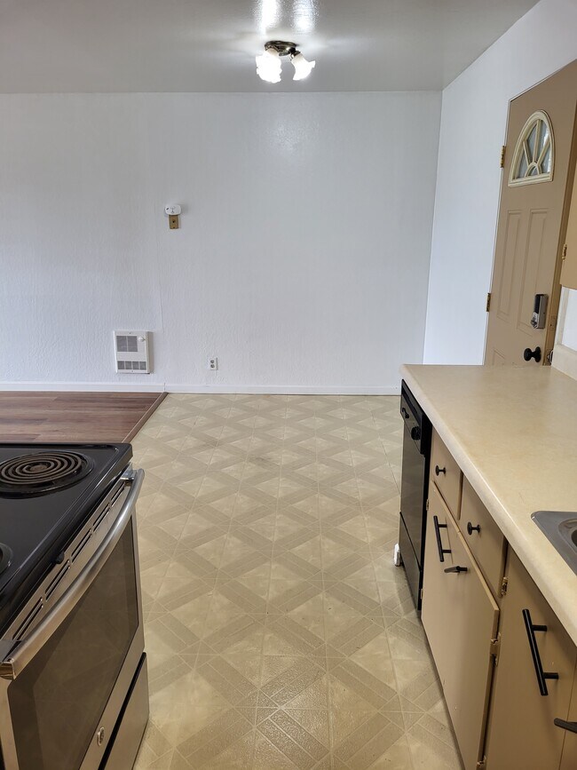 standing in kitchen - 21403 Gary Dr
