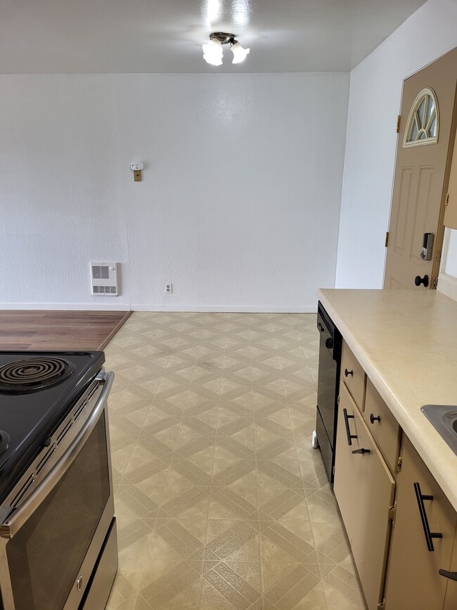 standing in kitchen - 21403 Gary Dr