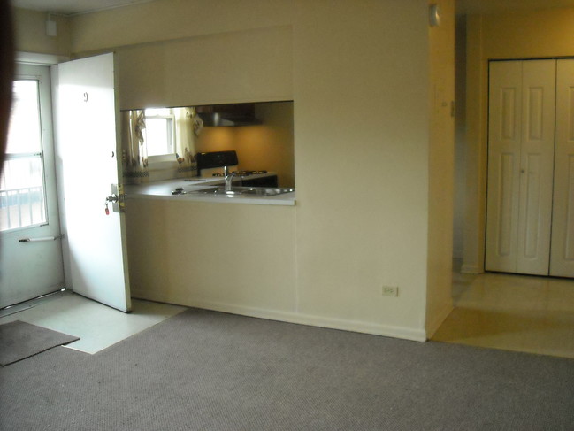 front room looking into kitchen area - 8516 47th St