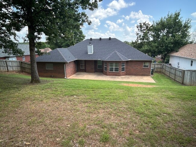 Back view of the house - 8709 Canopy Oaks Dr