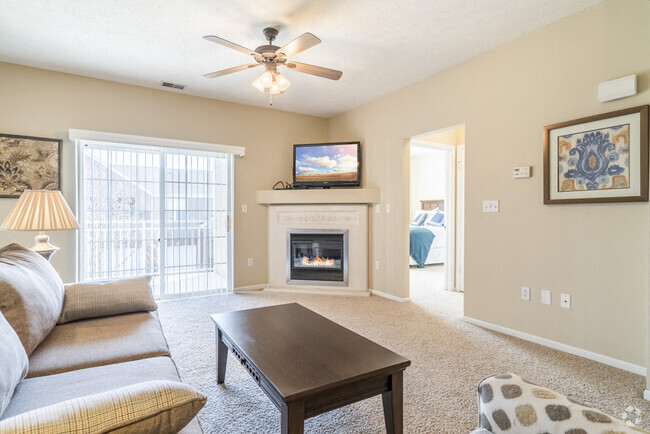 Our spacious floor plans include ceiling fans and ample natural lighting. - Ridge Pointe Villas