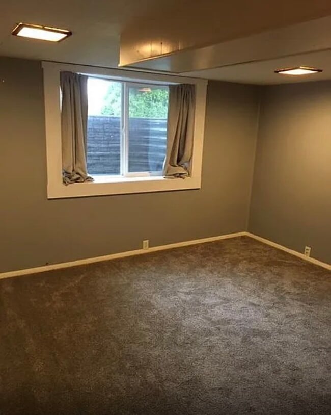 Basement room with egress window - 95 Harvard St