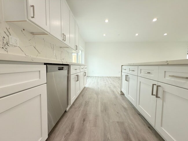 Building Photo - Chic Modern Living in Panorama City – 4 Be...