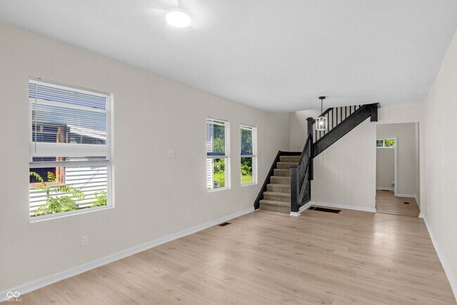 Foto del edificio - "Charming 3-Bed Duplex with Modern Comforts at 2235 MLK Jr Street, Indianapolis!"