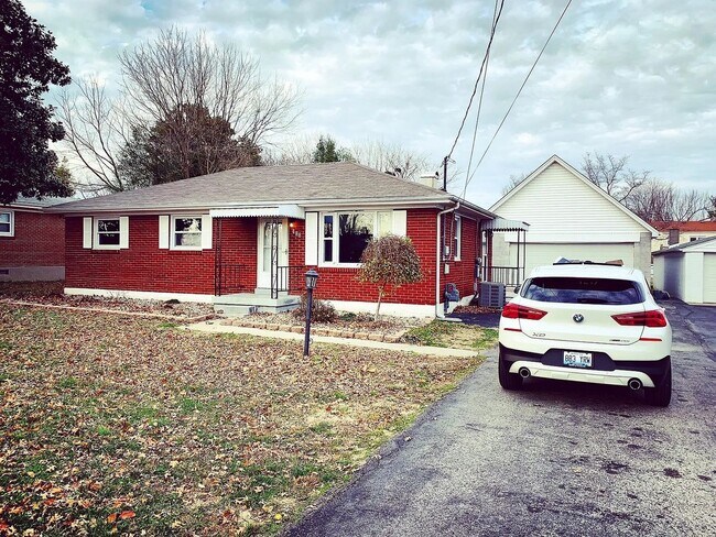 Building Photo - Charming Updated Home with Flexible Layout, Large Garage, and Modern Upgrades