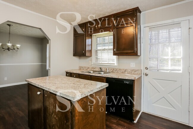 Building Photo - Welcome home to this stunning 4 bedroom, 2...