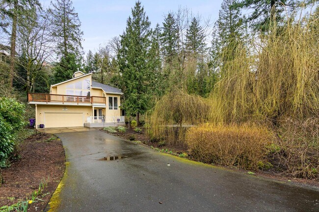 Building Photo - Forested, updated 3-bdr/2-bath contemporar...