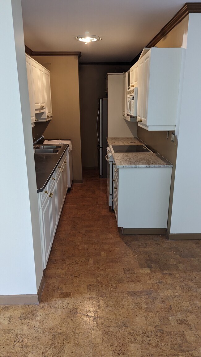 Photo du bâtiment - 715 15 Av SW