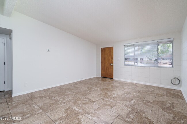 Building Photo - 7025 E Wilshire Dr