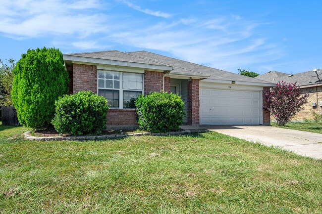 Building Photo - Welcome to this charming 4-bedroom, 2-bath...