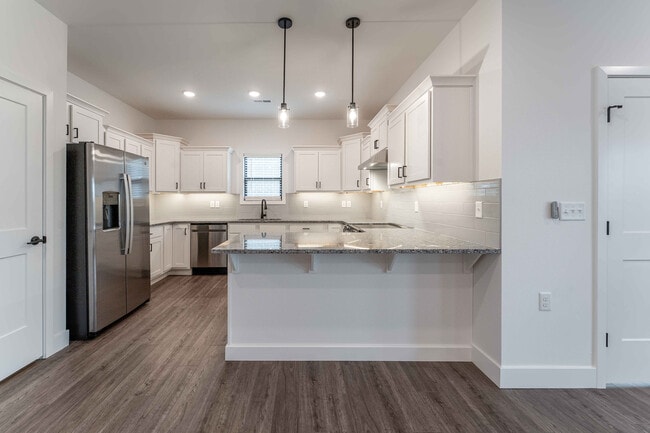 Villas-At-Anthony-Park-55-Plus-Community-South-Springfield-Missouri-Two-Bedroom-A-Unit-101B-Kitchen-Breakfast-Bar - Villas at Anthony Park