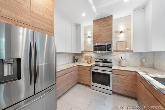 Building Photo - 7686 Corkwood Ave