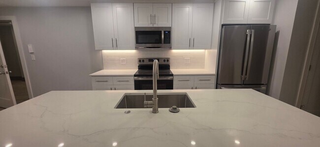 Building Photo - Get $1,000 on closing! NO FEE BRAND NEW LUXURY CONSTRUCTION, LAUNDRY IN UNIT, PARKING INCLUDED