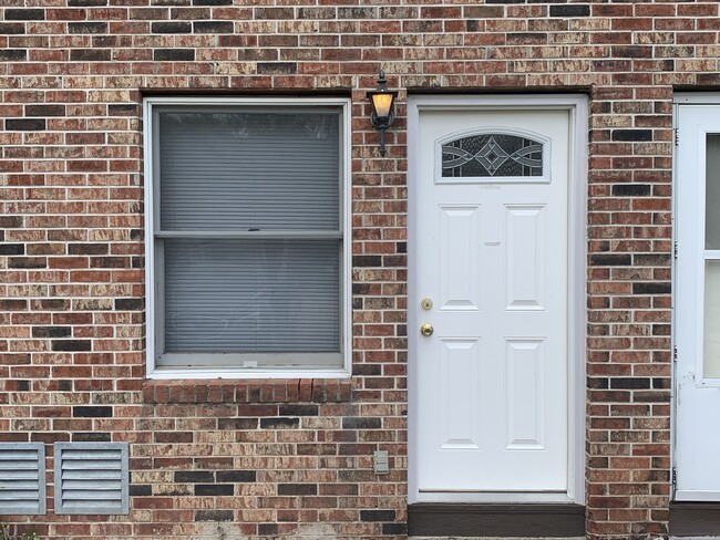 Classic 3-level brick townhomes. Ask about current rent incentives. - 1320 5th St W