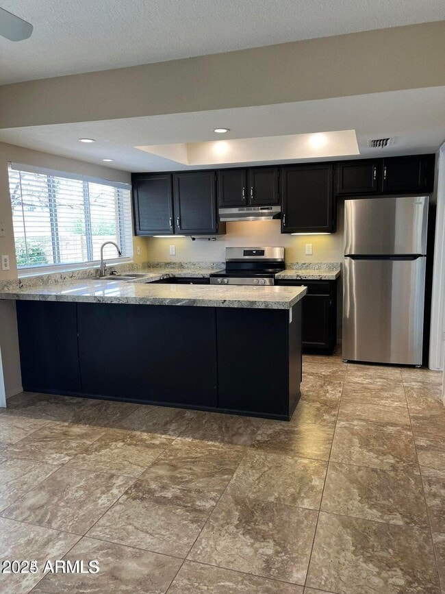 Building Photo - 6541 E Aire Libre Ln