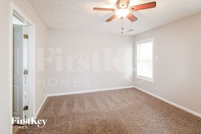 Building Photo - 4871 Candler Pond Rd
