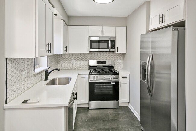 Foto del edificio - 7704 McVicker Ave
