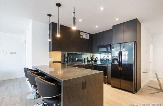 Building Photo - 5255 Collins Ave
