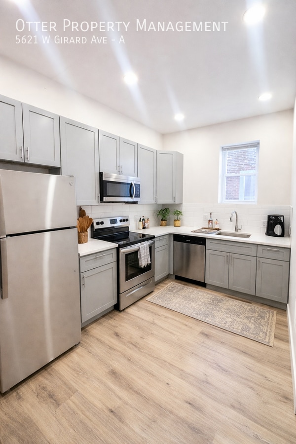 Photo - 5621 W Girard Ave Apartment