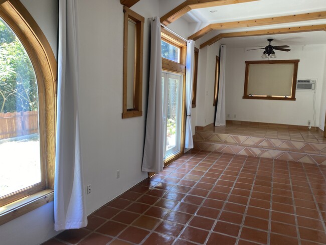 Step up area for bedroom. Was alter for chapel. - 6206 Temple Hill Dr