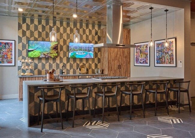 Cocina y salón comunitarios - The Pennant at North Crossing