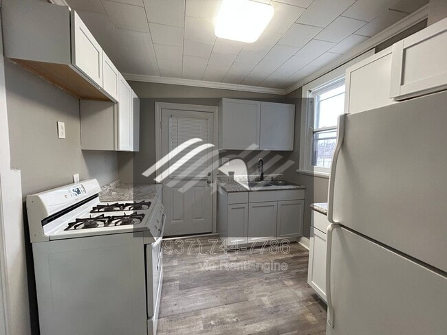 Building Photo - 5563 Bosworth Pl